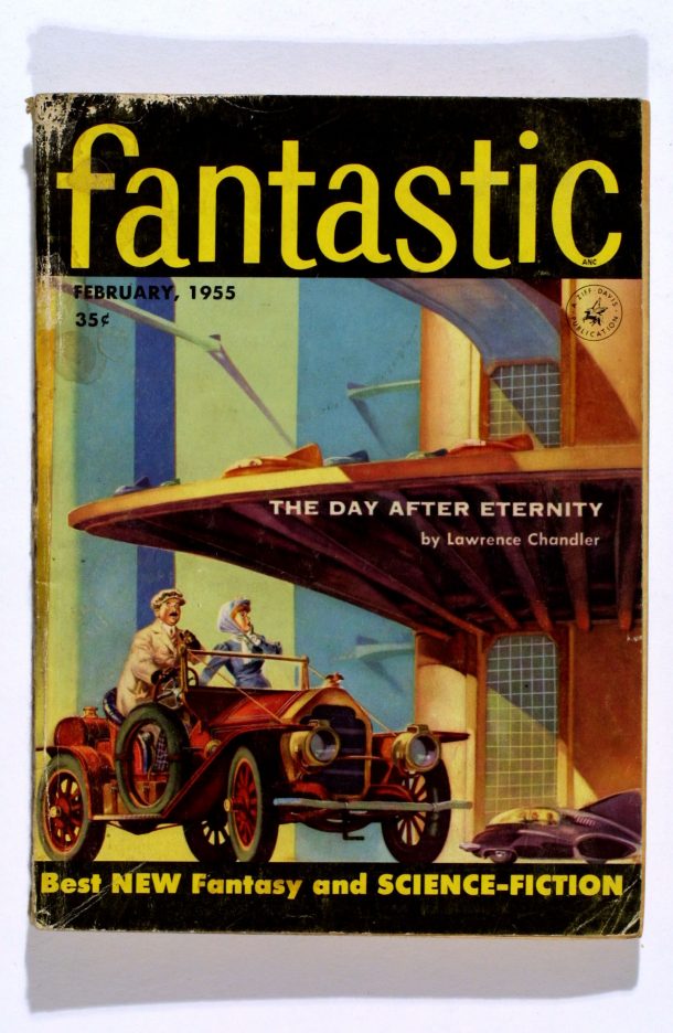 一本杂志的封面，展示了一座带有早期汽车的未来主义建筑